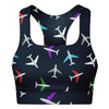 Front view of a padded sports bra featuring a vibrant airplane pattern with colorful aircraft designs on a dark background.